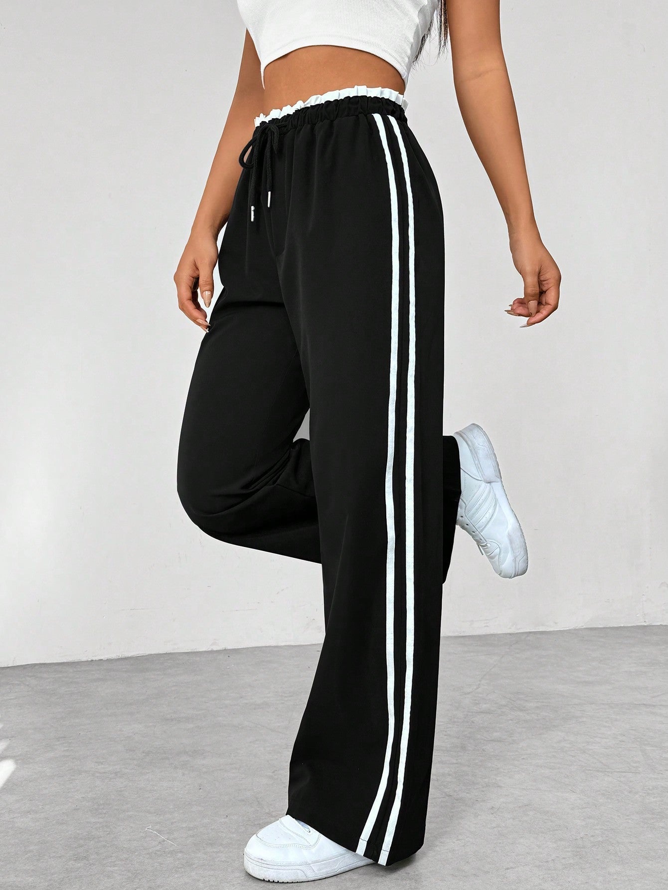 Selene – Sportieve wide-leg broek met trendy strependetail voor dames