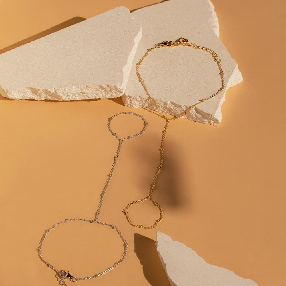 Sera - Minimalistische Gouden Handketting met Delicate Schakelarmband en Ring