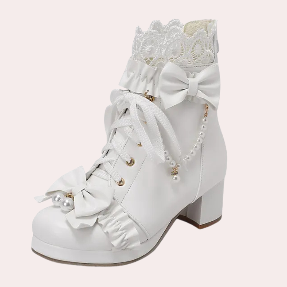 Velarisse – elegante dameslaarzen met strikdetail en verfijnde afwerking