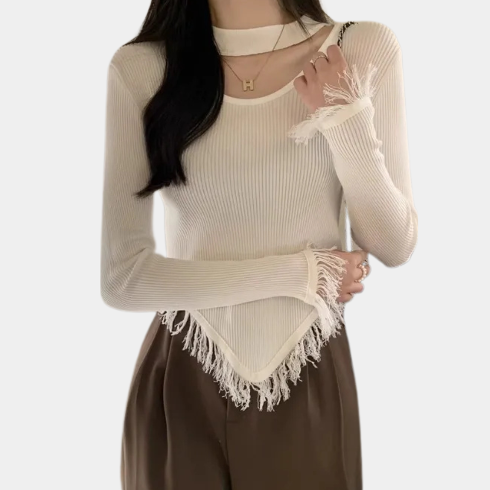 Norellia – Veelzijdige damestrui met speels kwastjesdetail