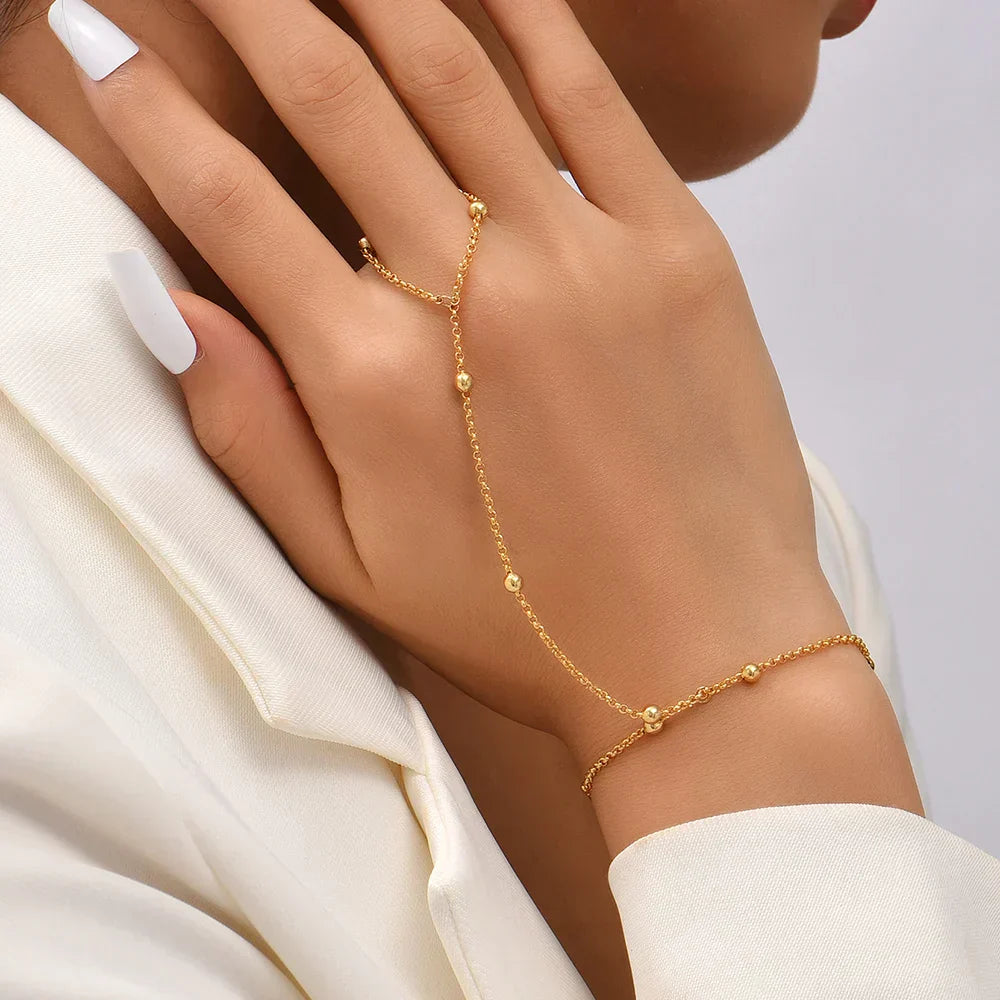 Aurelia Hand Chain – Verfijnde Elegantielijn in Goud