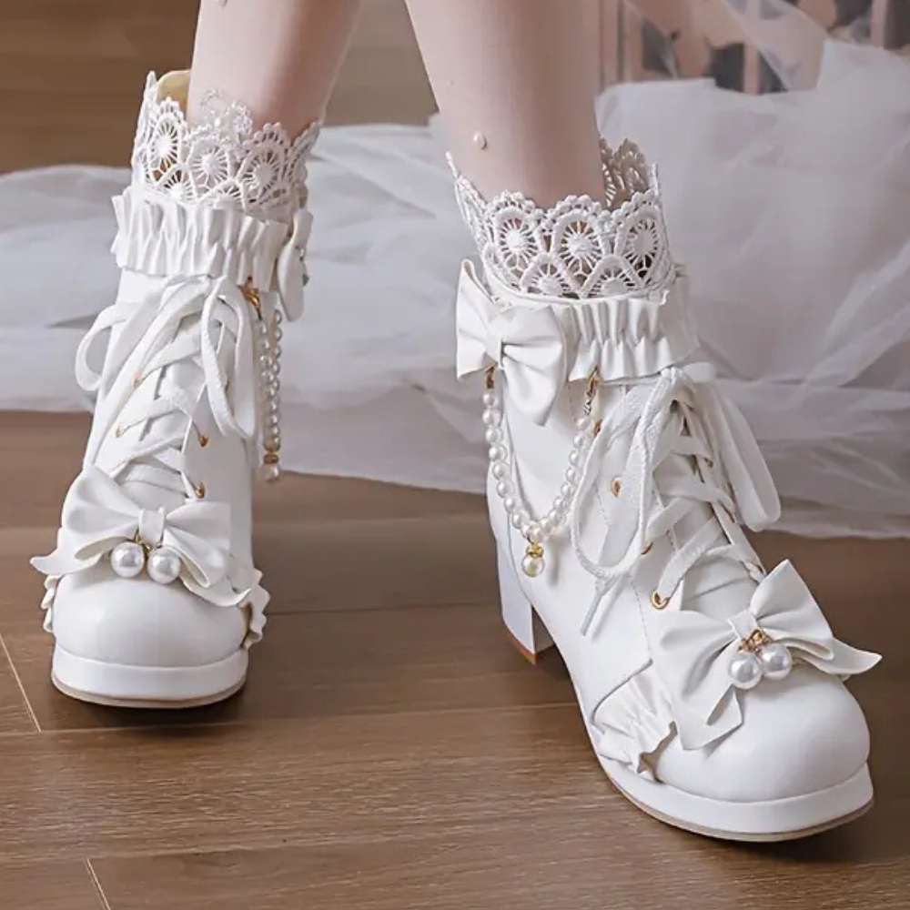 Velarisse – elegante dameslaarzen met strikdetail en verfijnde afwerking