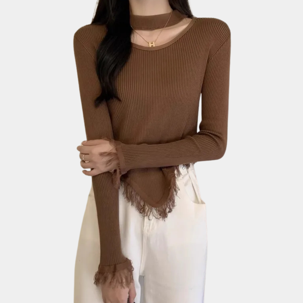 Norellia – Veelzijdige damestrui met speels kwastjesdetail