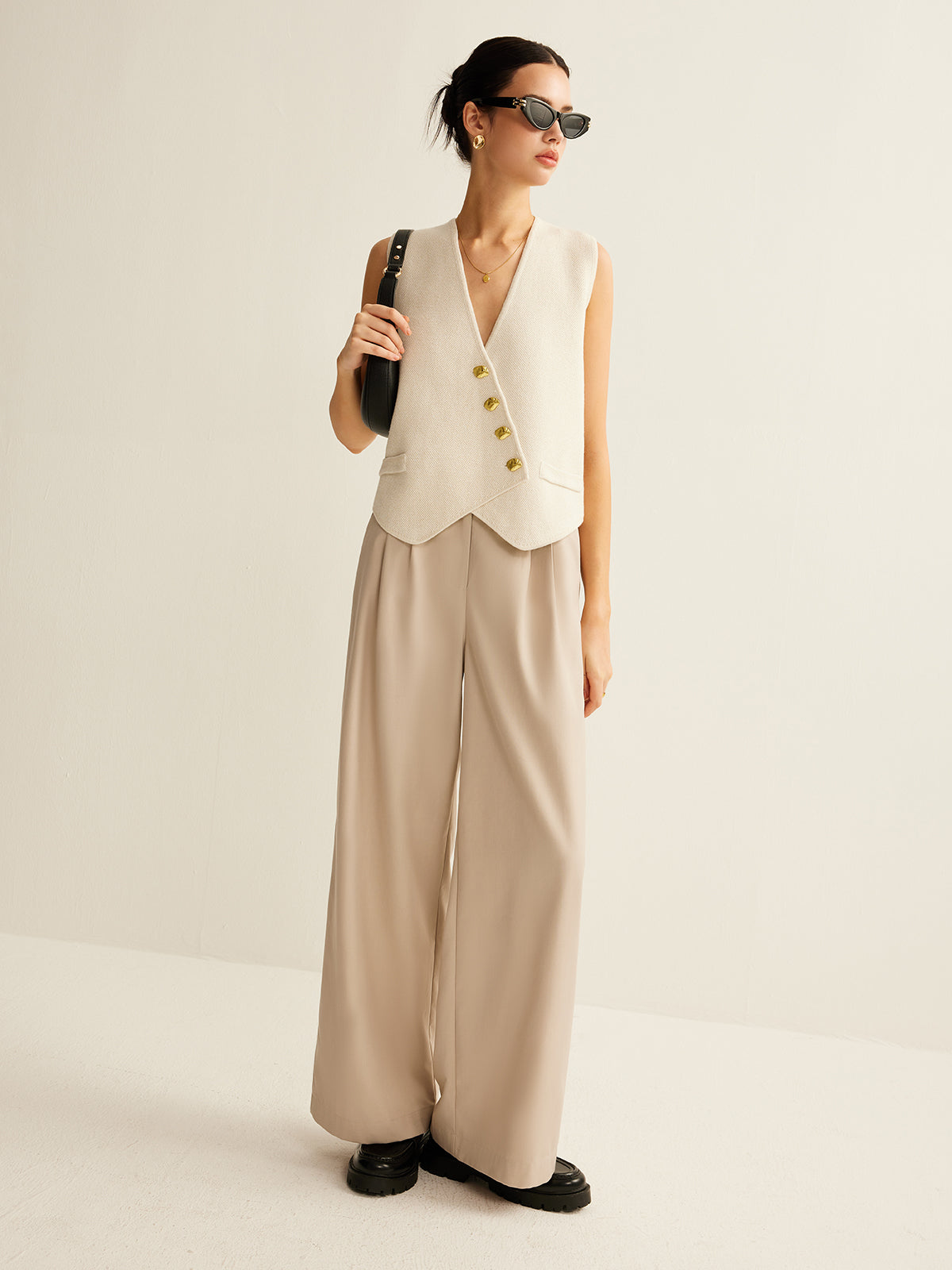 Asymmetrisch gebreid damesvest met knoopsluiting – regular fit en stretch