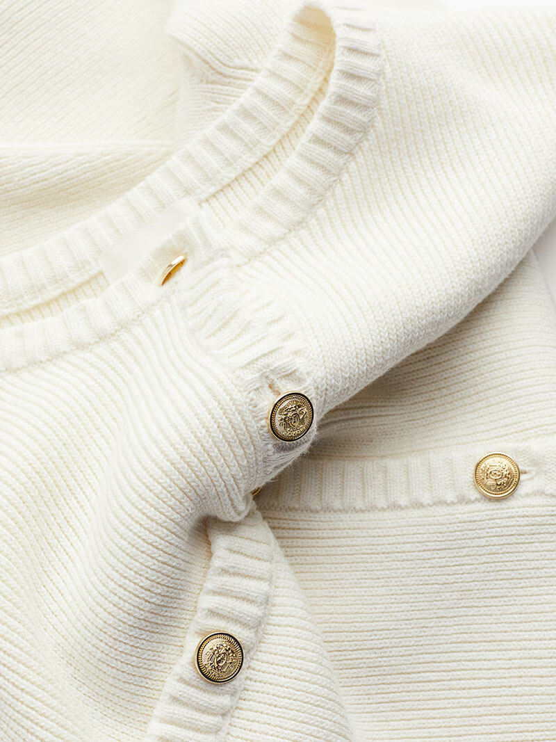 Gebreide dames mini jurk met ribstructuur en knoopsluiting – korte mouwen