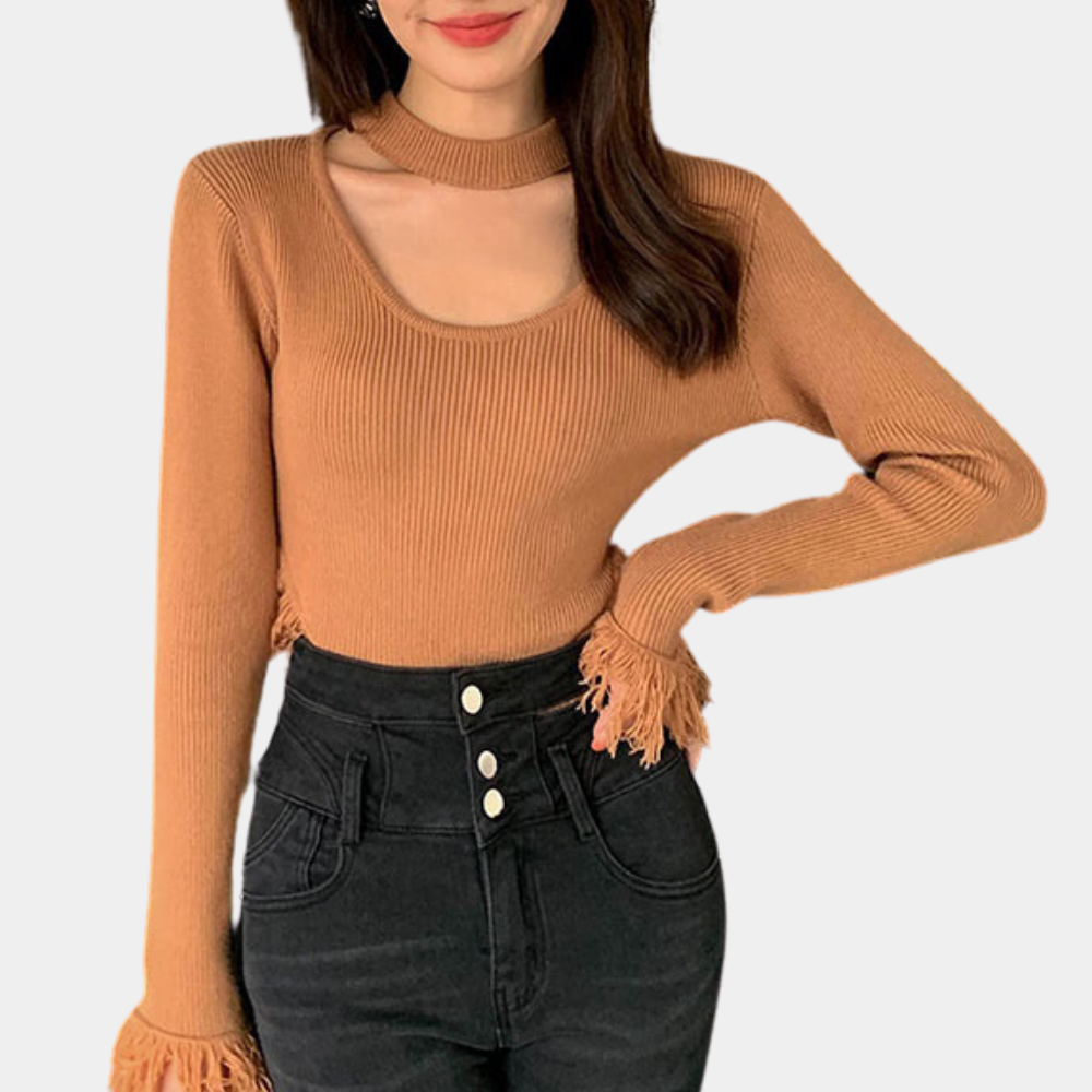 Norellia – Veelzijdige damestrui met speels kwastjesdetail